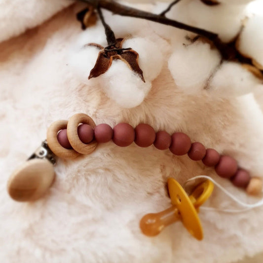 Attache-tétine en silicone cerclée de bois de hêtre